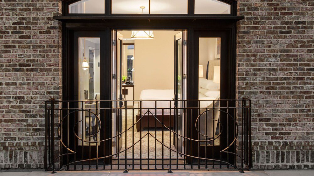 Guest room interior at The Spectator Hotel in Charleston